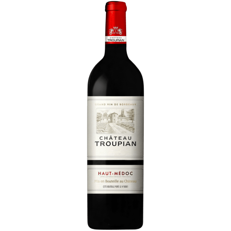 Bouteille de Château Troupian Haut-Médoc 2022 sur fond de barriques en chêne