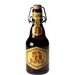 Bouteille de Barbãr Blonde 33 cl sur fond rustique, mettant en valeur sa robe dorée et sa mousse onctueuse.