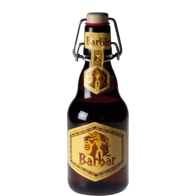 Bouteille de Barbãr Blonde 33 cl sur fond rustique, mettant en valeur sa robe dorée et sa mousse onctueuse.
